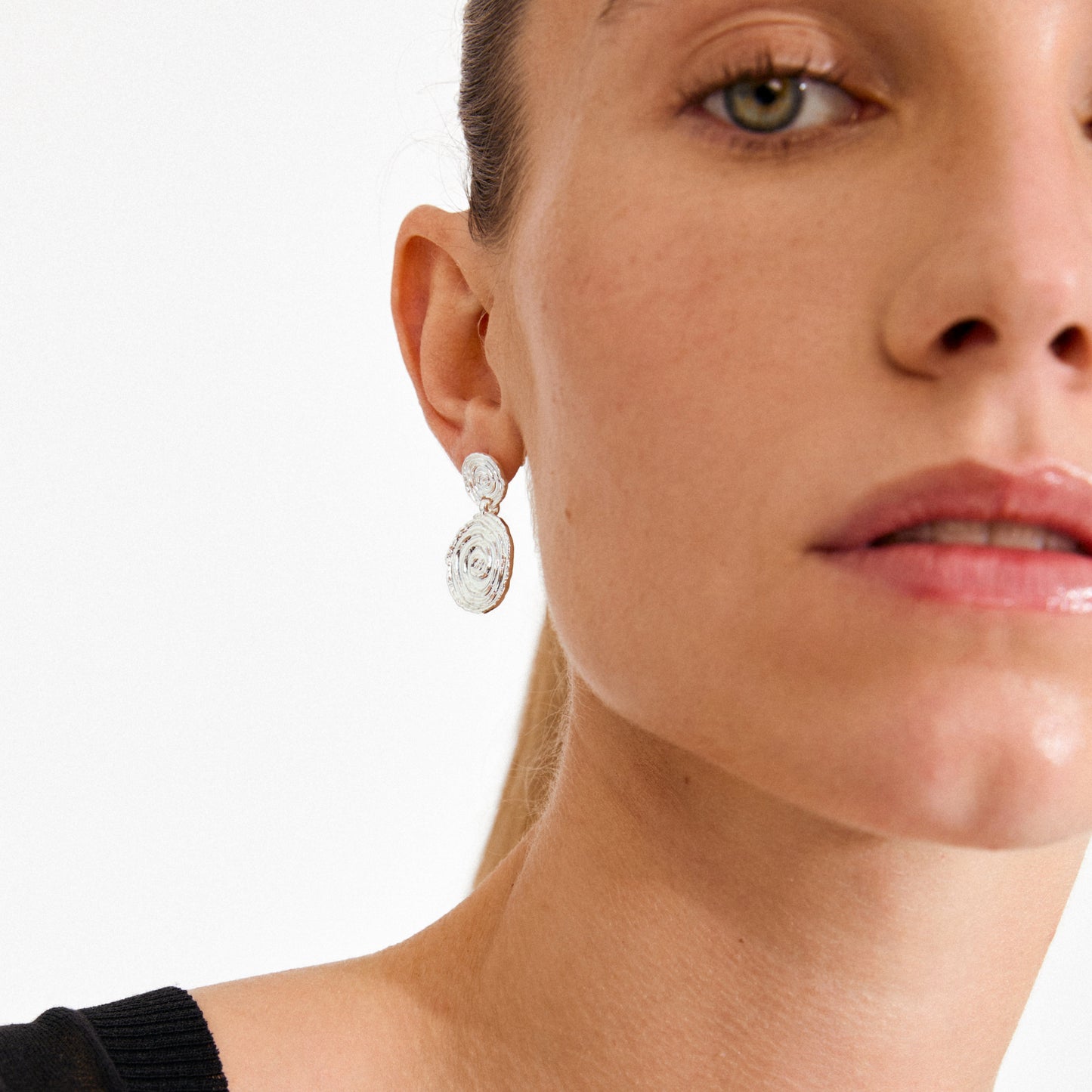 Boucles d'oreilles plaquées à l'air