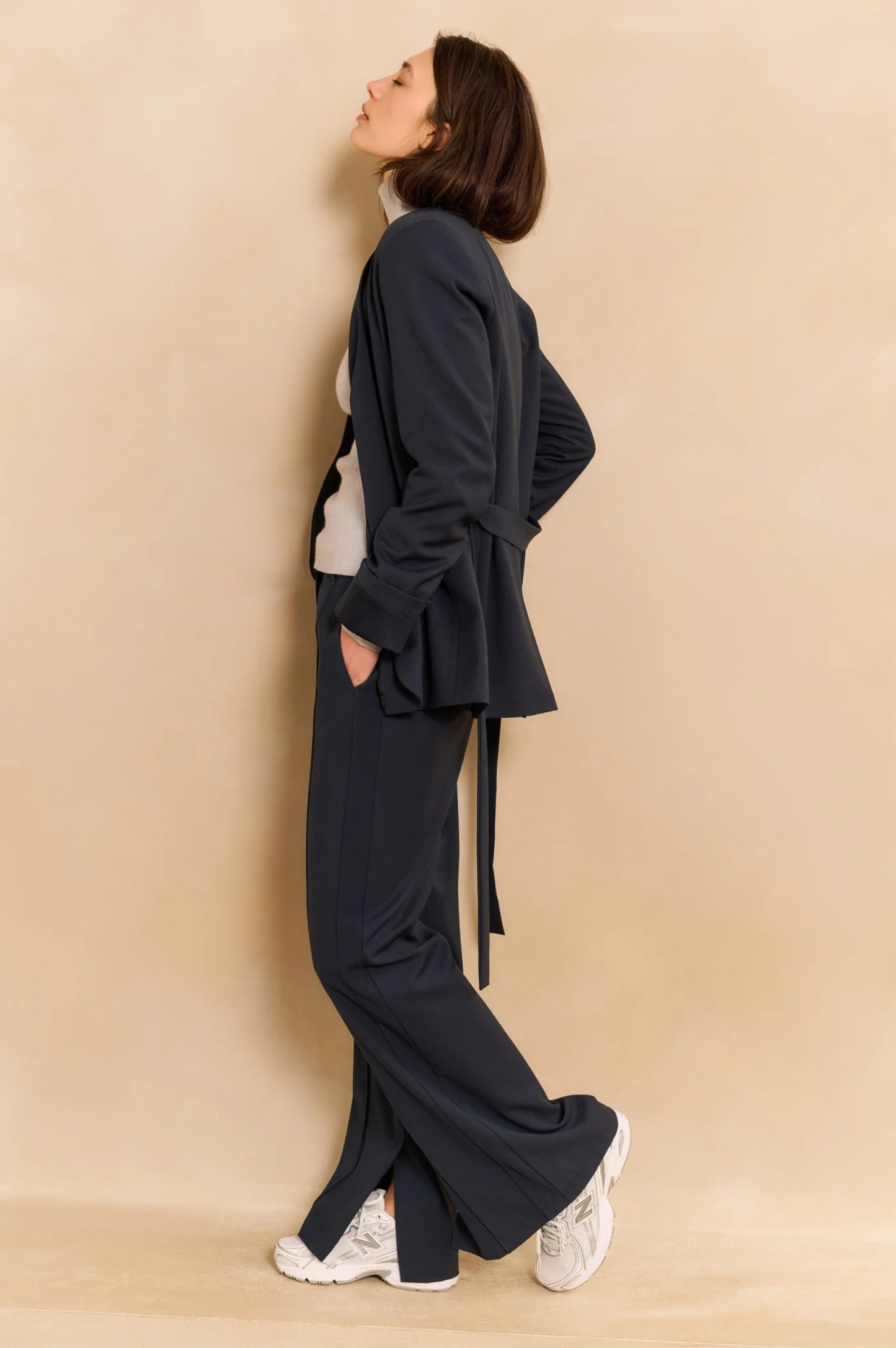 Wide leg trousers with decorative seams and slit