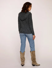 Load image into Gallery viewer, the model is wearing Heartloom Eren hoodie. The eren Hoodie features hooded sweater, with long sleeves and lace-ap detail in front. The Sweater is in a gorgeous coal color,  (7753001861328)
