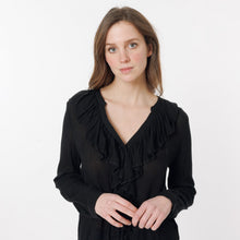 Load image into Gallery viewer, Model is wearing a black ARTLOVE SOLENE Blouse with ruffles on neck (7341140017360)
