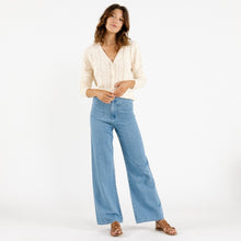 Load image into Gallery viewer, Model wearing cream FLORE Cardigan from Artlove with denim (7341054525648)
