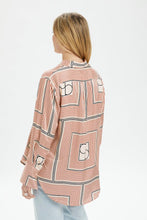 Load image into Gallery viewer, This photo contains a Kimaya shirt from Soaked in Luxury which has horizontal and vertical stripes forming squares with double half circles in the middle in black, brown and beige colors. (7700578599120)
