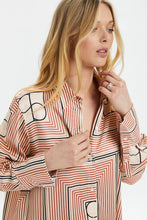 Load image into Gallery viewer, This photo contains a Kimaya shirt from Soaked in Luxury which has horizontal and vertical stripes forming squares with double half circles in the middle in black, brown and beige colors. (7700578599120)
