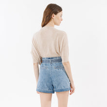 Load image into Gallery viewer, Model wearing beige Laurina Pullover with jeans shorts (7341141688528)
