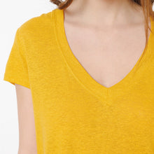 Load image into Gallery viewer, Model wearing Britney  mustard T-shirt from Artlove with jeans. (7340993151184)
