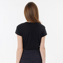 Load image into Gallery viewer, Model wearing Britney  black T-shirt from Artlove with jeans. (7340993151184)
